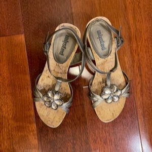 Very cute cork heels with silver top.